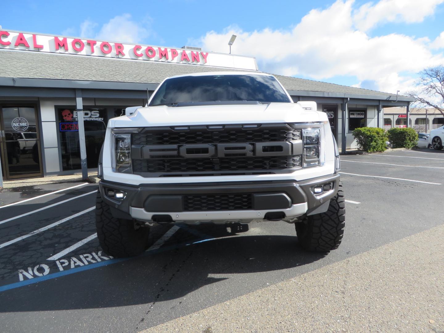 2023 White /BLACK Ford F-150 Raptor SuperCrew 4WD (1FTFW1RG6PF) with an 3.5 V6 engine, 6A transmission, located at 2630 Grass Valley Highway, Auburn, CA, 95603, (530) 508-5100, 38.937893, -121.095482 - Raptor sitting on Eibach front and rear springs, 37" Nitto Ridge Grappler tires, 17" Method NV wheels, and window tint. - Photo#1